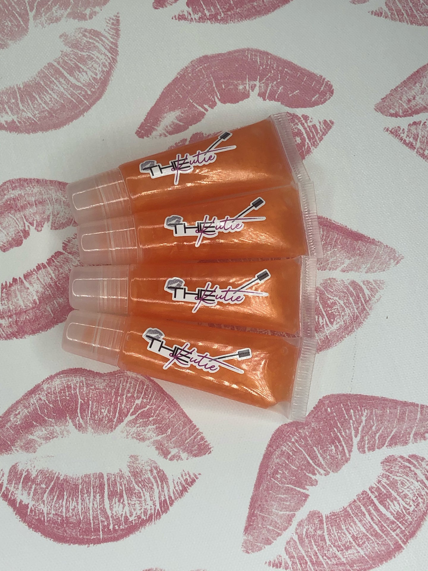 THE ORANGE KUTIE LIP GLOSS